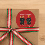 Cute Two Cat Christmas Lights Custom Red Gift Classic Round Sticker<br><div class="desc">This cute cat Christmas sticker features 2 black kittens wrapped in Xmas lights. Customize this pretty red holiday gift sticker for a friend or family member who loves their two cute kitties. Monogram their names in white under the adorable felines.</div>