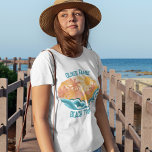 Cute Vintage Beach Waves Sunshine Vacation Women's T-Shirt<br><div class="desc">Cute vintage style women's t-shirts featuring beautiful teal ocean waves and a bright sun with palm trees in the summer. The cool grunge design is complimented with distressed teal blue custom text for your family vacation or beach trip.</div>