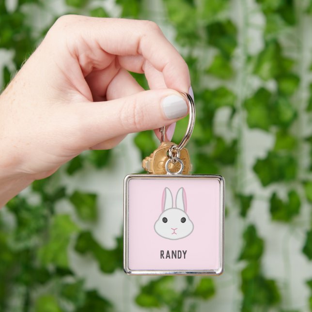 Cute white bunny on pink keychain (Hand)