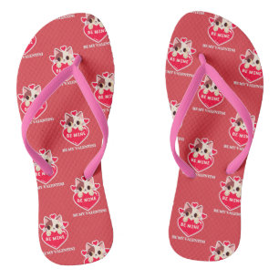 Cute white kitten with heart flip flops