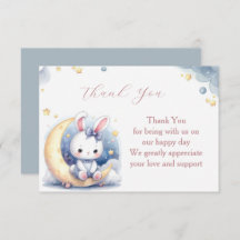 Cute white little bunny sitting on the moon