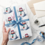 Cute White Red Snowman Christmas Winter Watercolor Wrapping Paper<br><div class="desc">This modern wrapping paper featuring a delightful watercolor illustration of a cheerful snowman dressed in festive red and green attire. Set against a snowy white winter wonderland background, this charming design captures the joyful essence of the season. The playful winter pattern is perfect for children and adds a fun, colourful...</div>