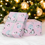 Cute winter penguin igloos snow illustration wrapping paper<br><div class="desc">Wrap your gifts in adorable style with our Chillin' with Baby Penguin-themed Wrapping Paper! This charming paper features delightful hand-painted watercolor penguins, igloos, and snowflakes on an icy blue backdrop and pastel pink background. Whether it's a baby shower or a winter-themed celebration, your presents will look extra special wrapped in...</div>