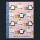 Cute Winter Penguins Snowman Pink Personalized Notebook<br><div class="desc">Make note-taking fun and festive with this adorable personalized notebook featuring cheerful penguins, snowmen, and colourful presents! Set against a pastel pink background with a contrasting blue spine, this whimsical design is perfect for kids or anyone who loves wintertime charm. Add your name or a special gift recipient's name for...</div>