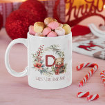 Cute Winter Teddy Bear Kids Name Christmas Gift Coffee Mug<br><div class="desc">Cute personalized kids Christmas Mug! Design features an adorable watercolor winter teddy bear,  wrapped up warm in a little brown coat and a red buffallo chequered scarf,  a festive wreath,  with a snow overlay.  Simply customize initial and name making this the perfect little gift!</div>