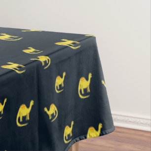 Cute yellow dinosaurs pattern on blue tablecloth