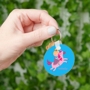 Cute Yellow Haired Girl Riding on a Unicorn Keychain