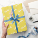 Cute Yellow White Personalized Script Name   Wrapping Paper<br><div class="desc">This cute wrapping paper features a colourful pattern of your name in modern cursive writing in yellow and white.</div>