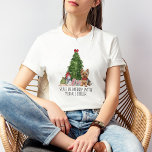 Cute Yorkshire Terrier Christmas Tee Custom Text<br><div class="desc">Our "T-shirt with Cute Yorkshire Terrier Print, Christmas Tee" is more than just clothing; it's a statement of love for your Yorkie companion. The vibrant print showcases a delightful Yorkie dog, surrounded by a festive Christmas tree, a sleigh filled with gifts, and a jolly snowman. It's a heartwarming scene that...</div>