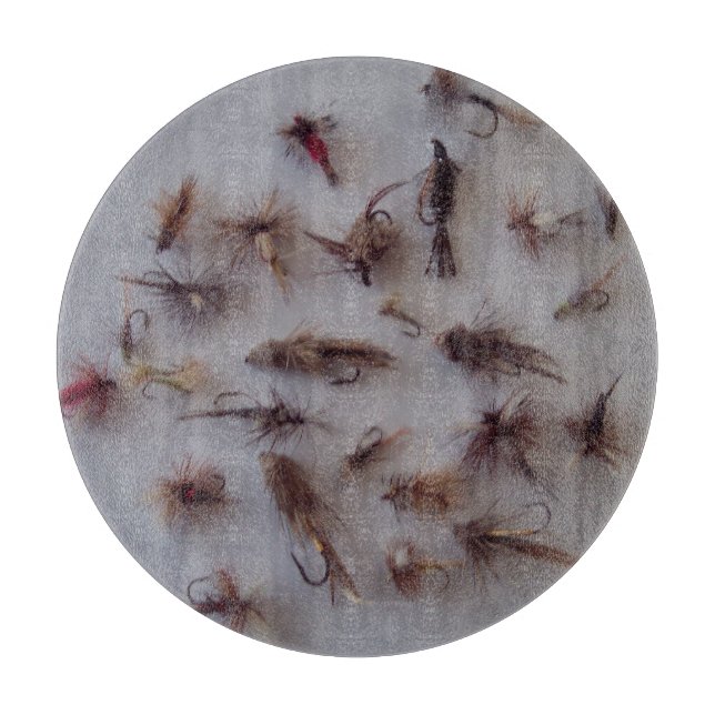 Cutting board of 12" decorative circular glass. (Front)