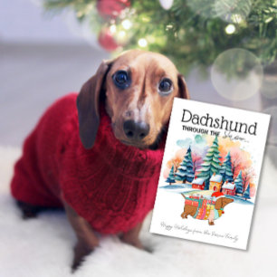 Dachshund à travers la neige Carte de Noël