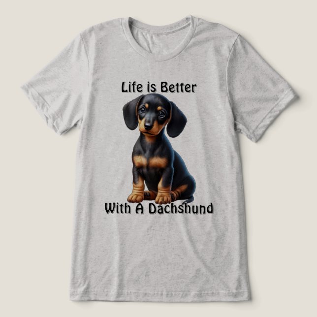 Dachshund Puppy Sitting and Looking with Innocent  Tri-Blend Shirt (Design Front)