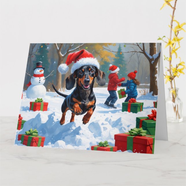 Dachshund Running in Snow with Christmas Hat Card (Yellow Flower)