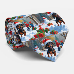 Dachshund Running in Snow with Christmas Hat Tie