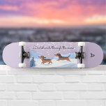 Dachshunds Through The Snow Monogrammed Christmas Skateboard<br><div class="desc">This fun skateboard features two lively dachshunds running happily through the winter snow. The caption above them is a festive pun, 'Dachshunds through the snow'. The cute picture is in a watercolor style, with the rest of the board a pastel lilac colour. Personalize the board with a monogram initial, which...</div>