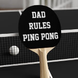 Dad Rules Ping Pong Paddle<br><div class="desc">Dad rules Ping Pong - he may let you win - but I doubt it. Fancy a different colour? Tap the customize it button and change it. Pick your dad's fave. Great gift for birthdays/Christmas/father's days ... you know..any time. Quirky Dad gift for dads.</div>