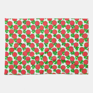 Dahlia flowers in deep red kitchen towel