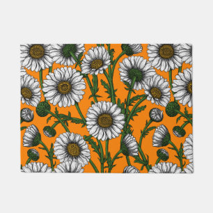 Daisies on orange doormat