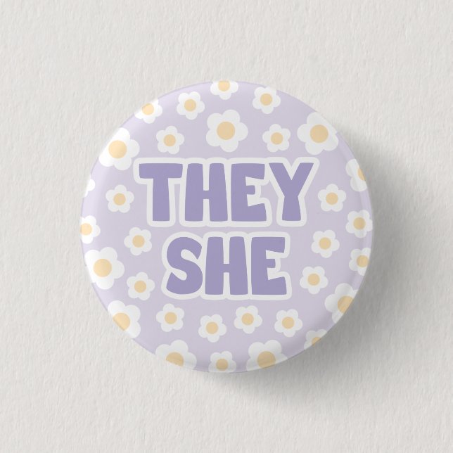 Daisies They/She Pronouns in Purple 1 Inch Round Button (Front)