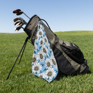 Daisies, wild flowers on blue golf towel