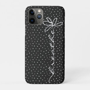 daisy breathe text on black with white polka dots iPhone 11 pro case