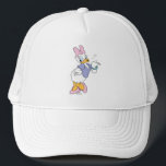 Daisy Duck Blowing a Kiss Trucker Hat<br><div class="desc">Spread a little love with this timeless and charming Daisy Duck character graphic! Captured in a classic, flirtatious pose blowing a delicate heart-shaped kiss, this design radiates sweetness and personality. With her iconic pink bow, purple blouse, and matching heels, this illustration is a beautiful celebration of classic animation style. The...</div>