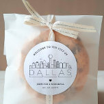 Dallas Skyline | Wedding Welcome Favour Classic Round Sticker<br><div class="desc">Enhance your wedding welcome packages or event party favours with a custom set of welcome stickers! These elegant yet minimal-style stickers are tailored for a wedding taking place in the beautiful city of Dallas, Texas. They feature a modern deco skyline with the name of the city integrated underneath. All elements...</div>