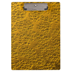 Damaged gold metal clipboard