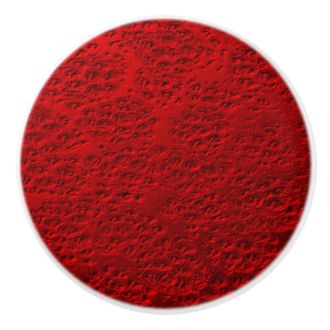 Damaged red metal ceramic knob (Front)