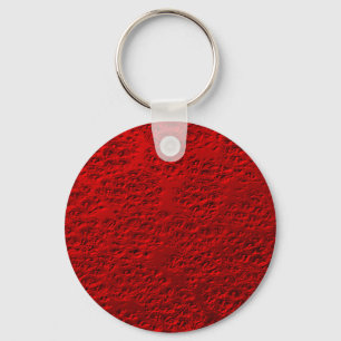 Damaged red metal keychain