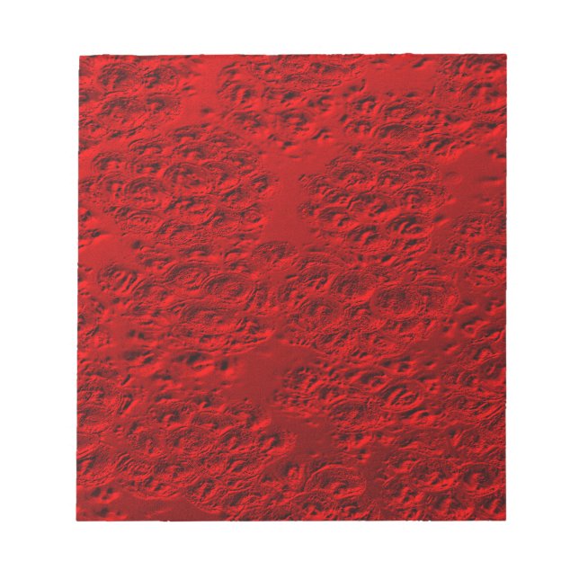 Damaged red metal notepad (Front)