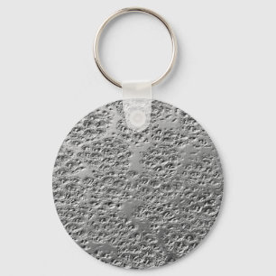 Damaged silver metal keychain