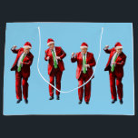 Dancing Donald Trump Christmas MAGA Large Gift Bag<br><div class="desc">Celebrate the holiday season with our Trump Christmas shirt, a perfect way to showcase your support for Donald Trump and the values that resonate with conservatives and Republicans. This festive design embodies the spirit of a Trump victory, reminding us of the promise to "Make America Great Again." As you gather...</div>