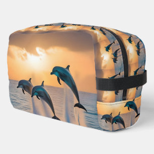 Dancing in the Dusk: Three Dolphins Leaping Dopp Kit