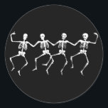 Dancing Skeletons II Classic Round Sticker<br><div class="desc">Images of white dancing skeletons.</div>