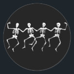 Dancing Skeletons II Classic Round Sticker<br><div class="desc">Images of white dancing skeletons.</div>