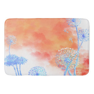 Dandelion clocks against coral orange clouds bath mat