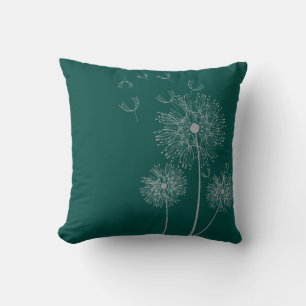 Dandelion flower on teal throw pillow