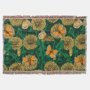 Dandelion meadow on dark green throw blanket