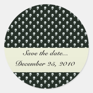 Dangerous white skull on retro black surface classic round sticker