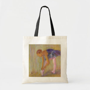 Danseur attachant ses chaussures de ballet, sac
