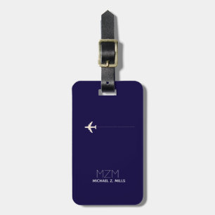 dark blue international travel tag with name