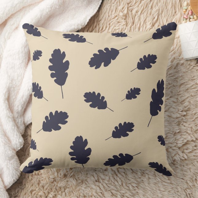 Dark blue oak leaves pattern on beige background throw pillow (Blanket)