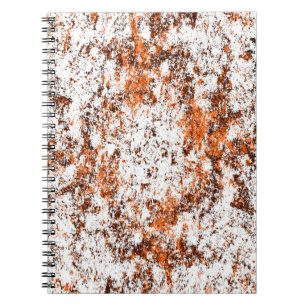 Dark brown grunge background. Black white orange o Notebook