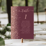 Dark Burgundy Rose Gold Glitter Wedding Table Number<br><div class="desc">The left-hand edge of this elegant modern wedding table number card features a rose gold faux glitter border. The word "table" appears in rose pink whimsical handwriting script on a dark burgundy background. Add the names of your guests who are assigned to each table.</div>