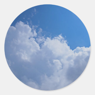 Dark clouds, blue sky and bright sun classic round sticker