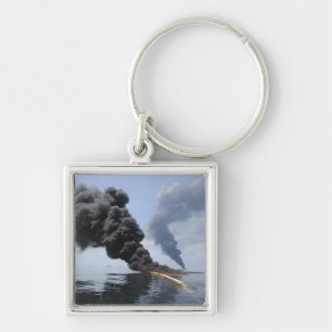 Dark clouds of smoke and fire emerge 3 keychain