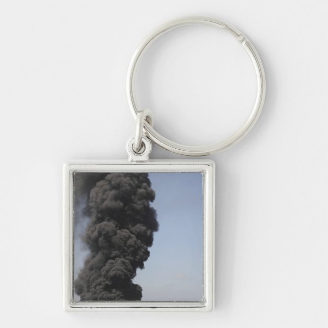 Dark clouds of smoke and fire emerge keychain (Front)