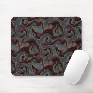 Dark coloured carved spiral parts and glow strokes mouse pad