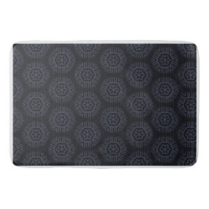 Dark gray hexagonal slightly darker gray backgrond bath mat